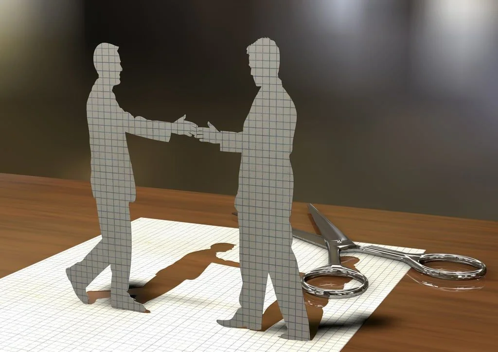 Scherenschnitt zwei Männer geben sich die Hand